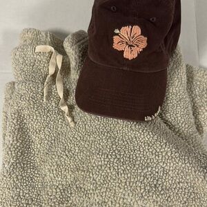 Gap sweatshirt and Life is Good ball cap.